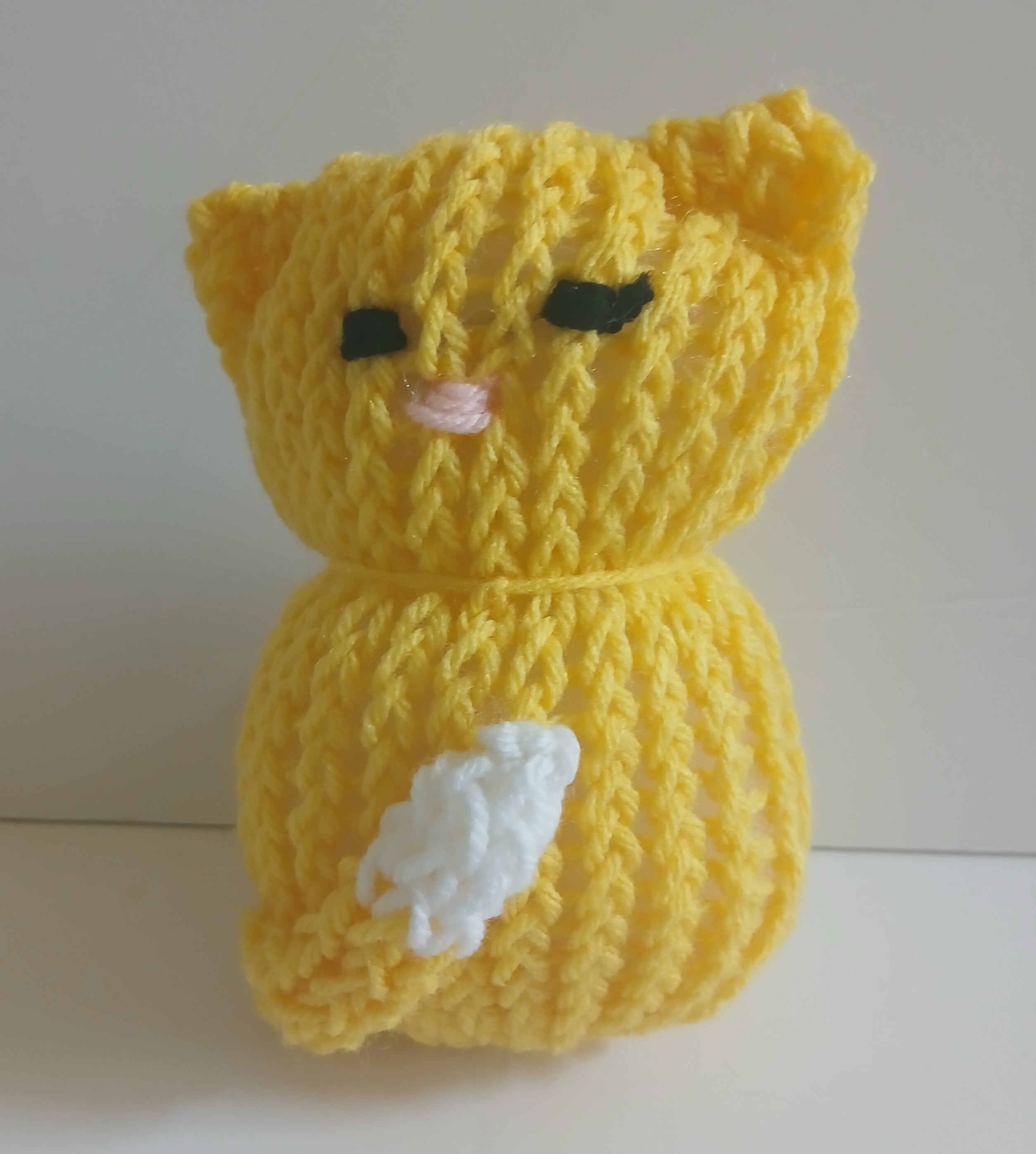 This beautifully handcrafted yellow kitty is designed to be your child’s cherished companion.