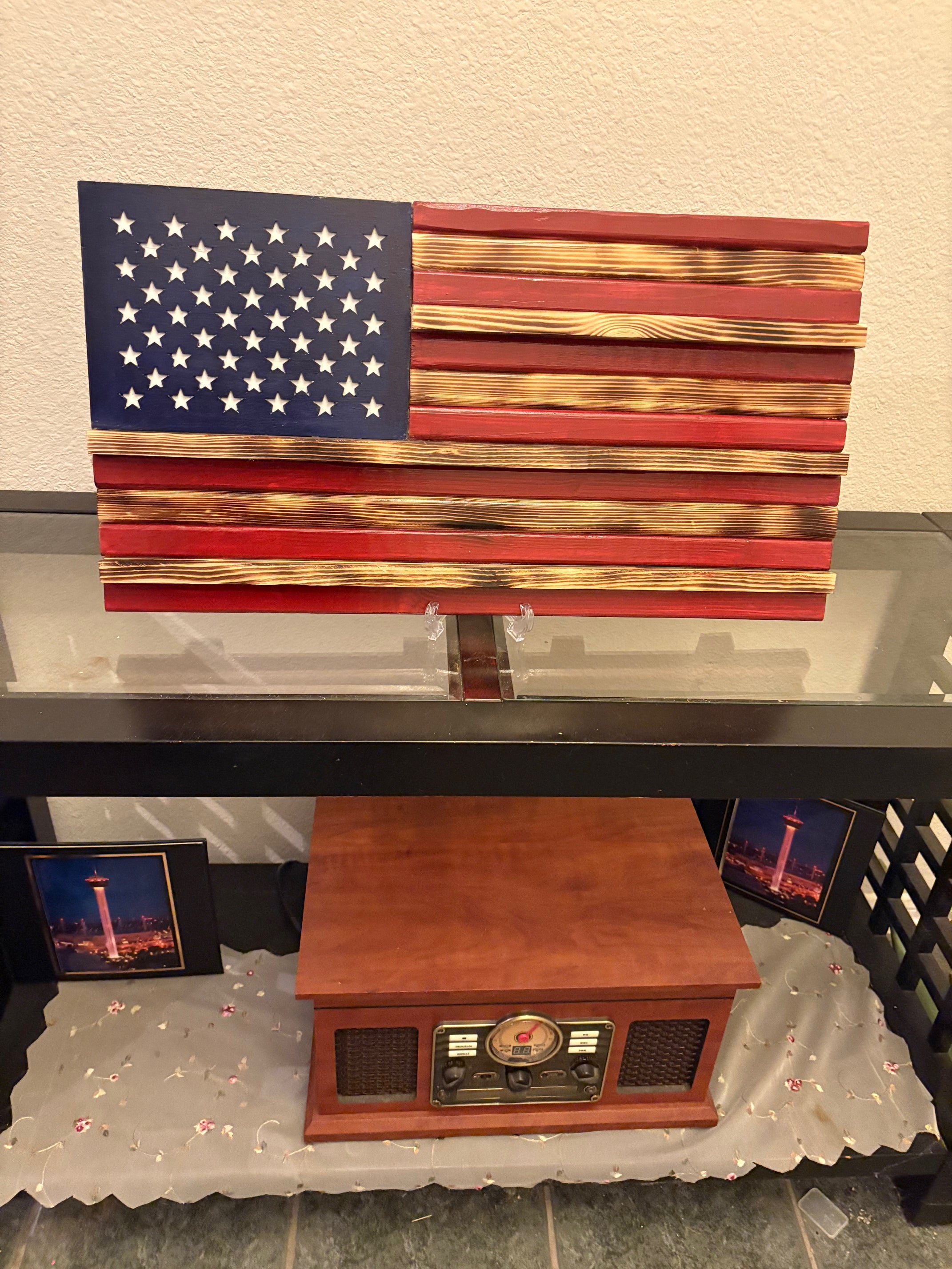 Showcase your remarkable collection of coins with pride using this stunning American flag challenge coin display. Crafted from high-quality wood, this American-made flag not only honors your experiences but also adds a touch of patriotism to any space.