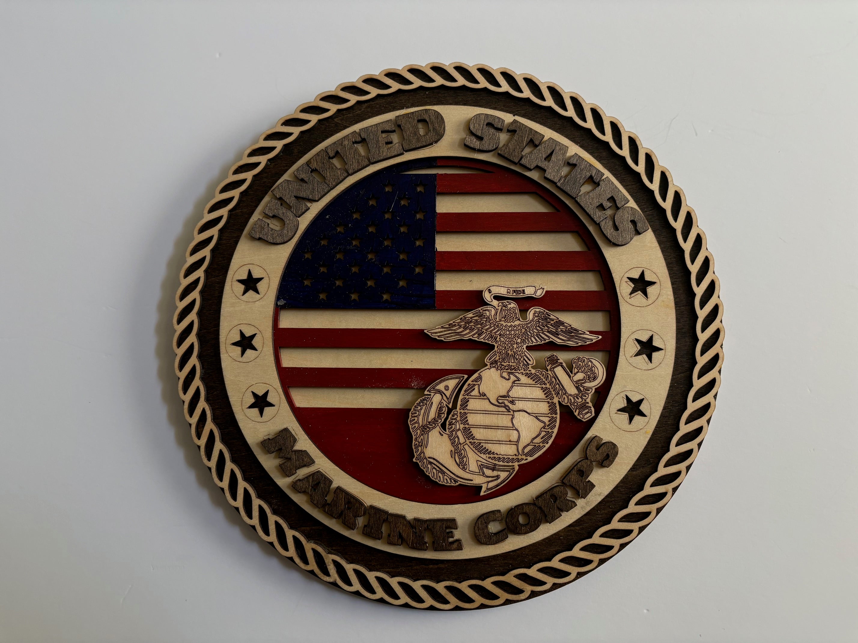 U.S. Marine Corps plaque features a finely detailed Logo set against a meticulously painted American flag backdrop,