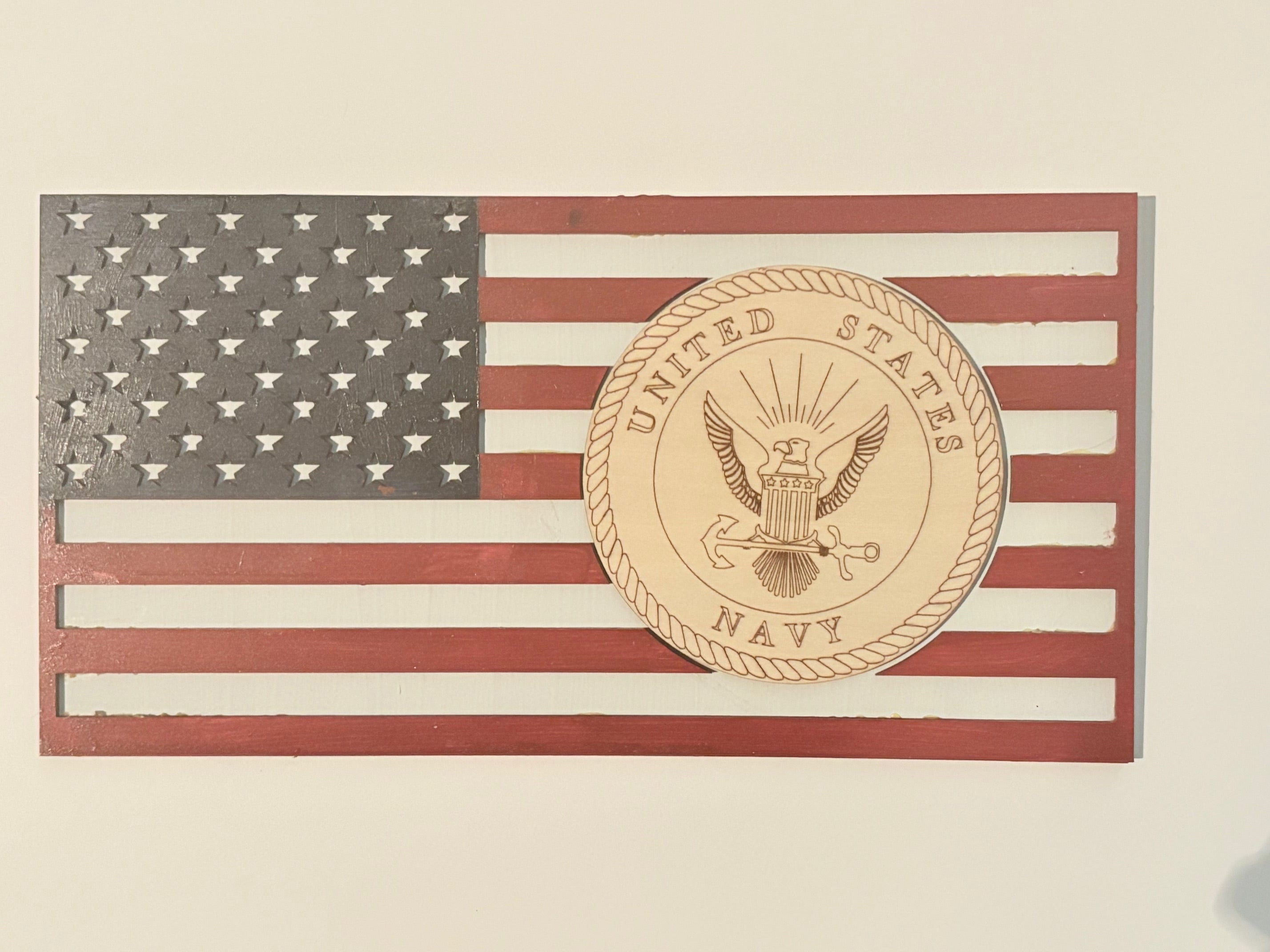 Celebrate patriotism with this Navy logo seamlessly integrated into the American flag,